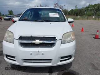 ✅ 2011 Chevrolet Aveo 1LT • VIN: KL1TD5DE0BB209550 • Lot: 43264668. Wystawiony na IAAI z przebiegiem 153 141 mil. Bezpłatny archiwum sprzedaży aukcyjnych z USA i szczegółowy raport historii pojazdu na DreamBid. Zdjęcie 6.