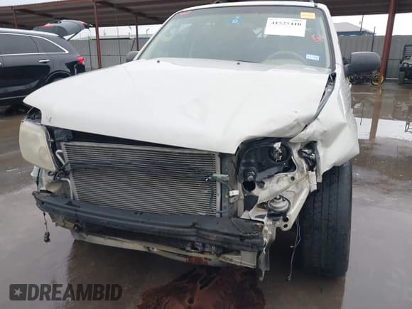 ✅ 2007 Mercury Mariner Convenience • VIN: 4M2YU80Z17KJ08849 • Lot: 41525410. Listed on IAAI with 227,293 mi. Free auction sales archive from the USA and detailed vehicle history report at DreamBid. Image 6.