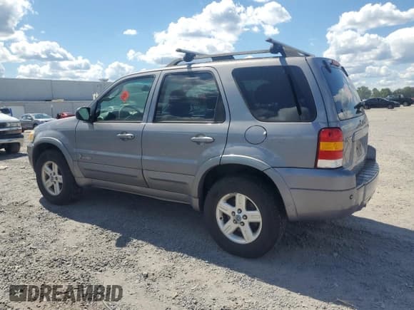✅ 2007 Ford Escape Hybrid • VIN: 1FMCU49H07KB60889 • Lot: 71118925. Wystawiony na Copart z przebiegiem 99 990 mil. Bezpłatny archiwum sprzedaży aukcyjnych z USA i szczegółowy raport historii pojazdu na DreamBid. Zdjęcie 2.