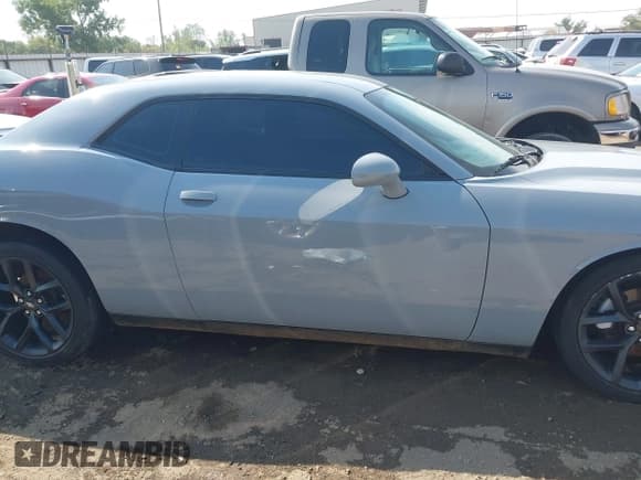 ✅ 2022 Dodge Challenger SXT • VIN: 2C3CDZAG8NH137597 • Lot: 43182589. Listed on IAAI with 39,666 mi. Free auction sales archive from the USA and detailed vehicle history report at DreamBid. Image 13.