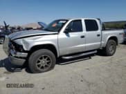 ✅ 2004 Dodge Dakota SLT • VIN: 1D7HG48N74S509797 • Lot: 57797055. Wystawiony na Copart z przebiegiem 214 275 mil. Bezpłatny archiwum sprzedaży aukcyjnych z USA i szczegółowy raport historii pojazdu na DreamBid. Zdjęcie 1.