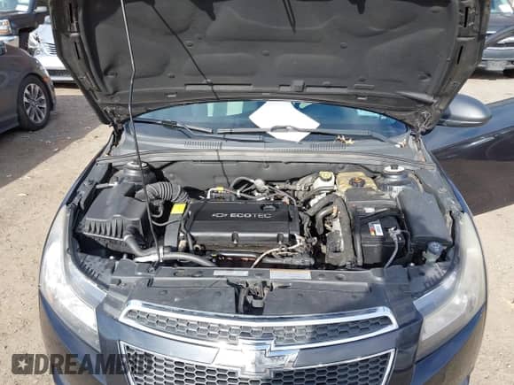 2014 Chevrolet Cruze LS z VIN 1G1PA5SG5E7213648, wystawiony jako IAAI lot #43625005 z przebiegiem 169 525 mil mil oraz . Historia ofert i sprzedaży dostępna na DreamBid. Obrazek 10.