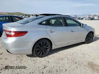 2013 Hyundai Azera с VIN KMHFH4JG1DA230244, выставлен на аукционе Copart как лот 51990655 с пробегом 150 607 миль миль и Списание • Salvage title. История ставок и продаж доступна на DreamBid. Изображение 3.
