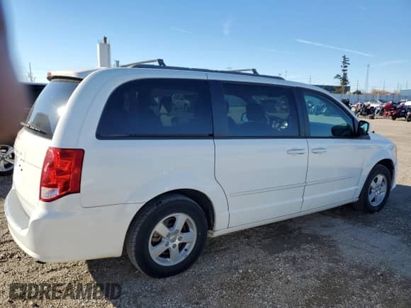 2012 Dodge Grand Caravan SXT z VIN 2C4RDGCG7CR149710, wystawiony jako Copart lot #90794405 z przebiegiem 83 305 mil mil oraz Czysty tytuł • Clean title. Historia ofert i sprzedaży dostępna na DreamBid. Obrazek 3.
