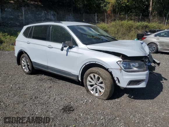 ✅ 2018 Volkswagen Tiguan SEL • VIN: 3VV2B7AX8JM100502 • Lot: 81006435. Listed on Copart with 89,904 mi. Free auction sales archive from the USA and detailed vehicle history report at DreamBid. Image 4.