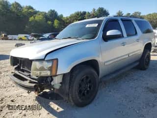 2013 Chevrolet Suburban LT with VIN 1GNSKJE78DR164877, listed as a Copart auction lot 85090485 with 114,904 mi miles and Clean title. Bid and sale history available at DreamBid. Image 1.