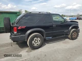 ✅ 1999 Chevrolet Blazer LS • VIN: 1GNCT18W6XK224253 • Lot: 50708405. Wystawiony na Copart z przebiegiem 209 711 mil. Bezpłatny archiwum sprzedaży aukcyjnych z USA i szczegółowy raport historii pojazdu na DreamBid. Zdjęcie 3.