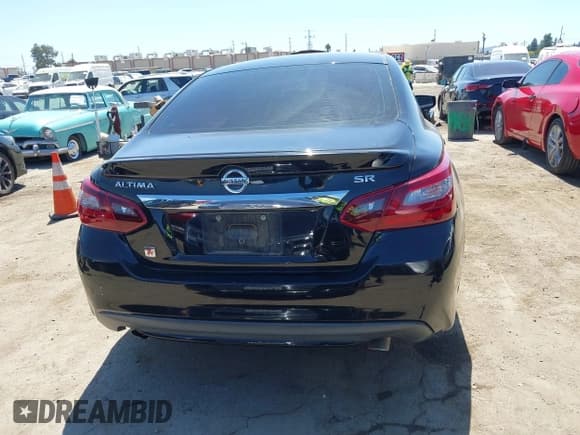 ✅ 2018 Nissan Altima S • VIN: 1N4AL3AP0JC101621 • Lot: 43117296. Listed on IAAI with 87,767 mi. Free auction sales archive from the USA and detailed vehicle history report at DreamBid. Image 16.