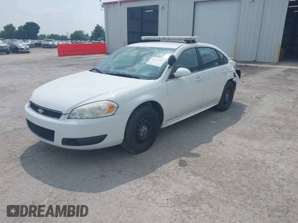 2013 Chevrolet Impala Police с VIN 2G1WD5E35D1166015, выставлен на аукционе IAAI как лот 42171708 с пробегом 169 790 миль миль и . История ставок и продаж доступна на DreamBid. Изображение 2.