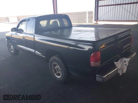 ✅ 2000 Dodge Dakota • VIN: 1B7GL22X2YS587619 • Lot: 43484603. Listed on IAAI with 230,262 mi. Free auction sales archive from the USA and detailed vehicle history report at DreamBid. Image 3.