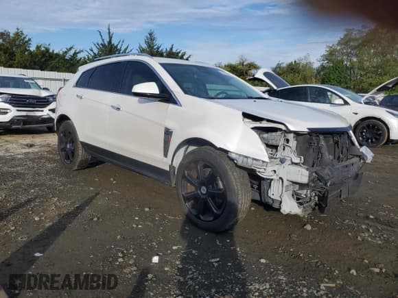 ✅ 2013 Cadillac SRX Premium Collection • VIN: 3GYFNEE32DS533844 • Lot: 86280585. Wystawiony na Copart z przebiegiem 115 438 mil. Bezpłatny archiwum sprzedaży aukcyjnych z USA i szczegółowy raport historii pojazdu na DreamBid. Zdjęcie 4.