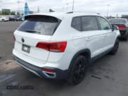 ✅ 2023 Volkswagen Taos SE • VIN: 3VVEX7B22PM327758 • Lot: 43419842. Listed on IAAI with 28,091 mi. Free auction sales archive from the USA and detailed vehicle history report at DreamBid. Image 4.