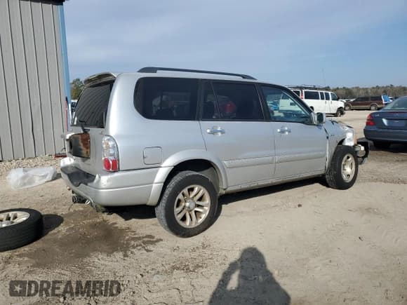 ✅ 2004 Suzuki XL7 LX • VIN: JS3TY92V744104987 • Lot: 43455315. Listed on Copart with 211,431 mi. Free auction sales archive from the USA and detailed vehicle history report at DreamBid. Image 3.
