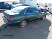 ✅ 1999 Acura Integra • VIN: JH4DB7660XS001176 • Lot: 41851522. Listed on IAAI with 174,280 mi. Free auction sales archive from the USA and detailed vehicle history report at DreamBid. Image 4.