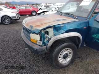 1993 Dodge Dakota z VIN 1B7GG26X3PS277833, wystawiony jako IAAI lot #41634223 z przebiegiem 100 092 mil mil oraz . Historia ofert i sprzedaży dostępna na DreamBid. Obrazek 6.