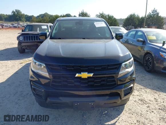 ✅ 2021 Chevrolet Colorado 2WD LT • VIN: 1GCHSCEA6M1234904 • Lot: 43257407. Listed on IAAI with 57,149 mi. Free auction sales archive from the USA and detailed vehicle history report at DreamBid. Image 12.