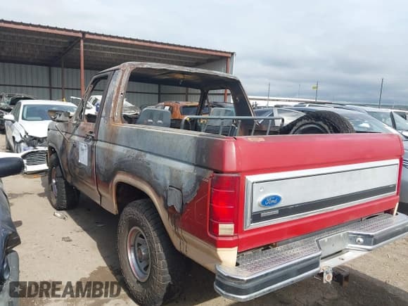 ✅ 1985 Ford Bronco Custom • VIN: 1FMDU15NXFLA68616 • Lot: 42860917. Listed on IAAI with Not provided. Free auction sales archive from the USA and detailed vehicle history report at DreamBid. Image 3.