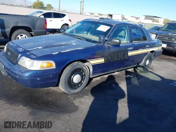 ✅ 2004 Ford Police Interceptor Base w/3.27 Axle • VIN: 2FAFP71W54X101274 • Lot: 41164206. Wystawiony na IAAI z przebiegiem 128 237 mil. Bezpłatny archiwum sprzedaży aukcyjnych z USA i szczegółowy raport historii pojazdu na DreamBid. Zdjęcie 2.