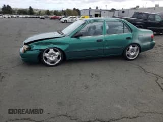 ✅ 1998 Toyota Corolla CE • VIN: 1NXBR12E4WZ017846 • Lot: 82303485. Wystawiony na Copart z przebiegiem 231 024 mil. Bezpłatny archiwum sprzedaży aukcyjnych z USA i szczegółowy raport historii pojazdu na DreamBid. Zdjęcie 1.