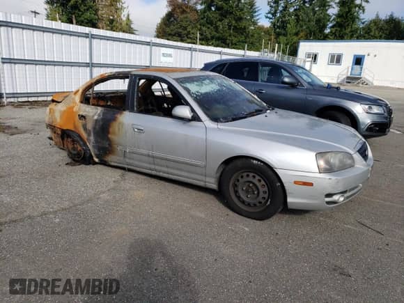 2006 Hyundai Elantra GLS z VIN KMHDN46D66U313202, wystawiony jako Copart lot #72598494 z przebiegiem Nie podano mil oraz Szkoda całkowita • Salvage title. Historia ofert i sprzedaży dostępna na DreamBid. Obrazek 4.