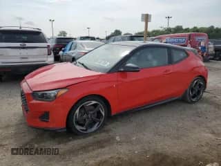 2019 Hyundai Veloster Turbo z VIN KMHTH6AB7KU002831, wystawiony jako Copart lot #65617055 z przebiegiem 141 604 mil mil oraz Czysty tytuł • Clean title. Historia ofert i sprzedaży dostępna na DreamBid. Obrazek 1.