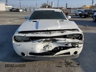 ✅ 2013 Dodge Challenger SXT • VIN: 2C3CDYAGXDH673024 • Lot: 91372455. Wystawiony na Copart z przebiegiem 199 049 mil. Bezpłatny archiwum sprzedaży aukcyjnych z USA i szczegółowy raport historii pojazdu na DreamBid. Zdjęcie 5.