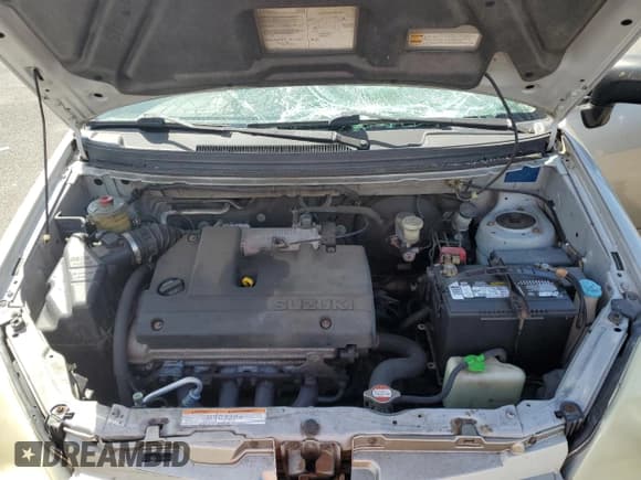 ✅ 2006 Suzuki Aerio Premium • VIN: JS2RA62S265305250 • Lot: 48345815. Wystawiony na Copart z przebiegiem 127 121 mil. Bezpłatny archiwum sprzedaży aukcyjnych z USA i szczegółowy raport historii pojazdu na DreamBid. Zdjęcie 11.