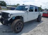 ✅ 2023 Jeep Gladiator Rubicon • VIN: 1C6JJTBG5PL580701 • Lot: 43017445. Listed on IAAI with 25,757 mi. Free auction sales archive from the USA and detailed vehicle history report at DreamBid. Image 2.