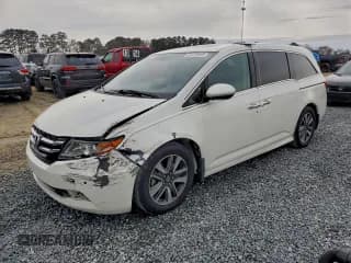 ✅ 2015 Honda Odyssey Touring Elite • VIN: 5FNRL5H97FB102212 • Лот: 95472645. Опубликован ранее на Copart с пробегом 140 270 миль. Бесплатный доступ к архиву аукционных продаж из США и подробный отчёт об истории автомобиля на DreamBid. Изображение 1.