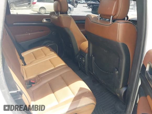 ✅ 2015 Jeep Grand Cherokee • VIN: 1C4RJEJM8FC674648 • Lot: 42785823. Listed on IAAI with 207,084 mi. Free auction sales archive from the USA and detailed vehicle history report at DreamBid. Image 8.