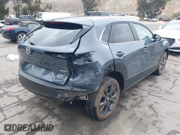 ✅ 2022 Mazda CX-30 S Carbon Edition • VIN: 3MVDMBCL0NM456154 • Lot: 42153202. Listed on IAAI with 40,372 mi. Free auction sales archive from the USA and detailed vehicle history report at DreamBid. Image 4.