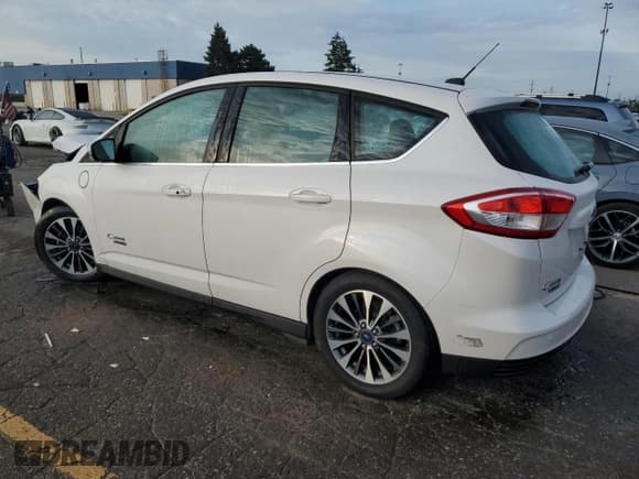 ✅ 2017 Ford C-Max Titanium • VIN: 1FADP5FU8HL106877 • Лот: 71734905. Опубликован ранее на Copart с пробегом 73 633 миль. Бесплатный доступ к архиву аукционных продаж из США и подробный отчёт об истории автомобиля на DreamBid. Изображение 2.