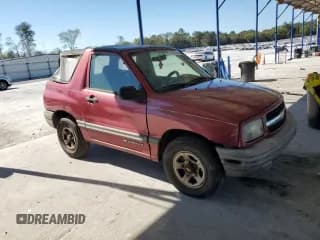 ✅ 2001 Chevrolet Tracker • VIN: 2CNBE18C016924375 • Lot: 87088435. Listed on Copart with 143,586 mi. Free auction sales archive from the USA and detailed vehicle history report at DreamBid. Image 4.