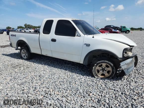 ✅ 2003 Ford F-150 XL • VIN: 2FTRX18WX3CA73133 • Lot: 58734795. Listed on Copart with 197,519 mi. Free auction sales archive from the USA and detailed vehicle history report at DreamBid. Image 4.