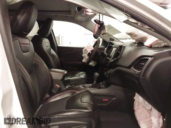 ✅ 2022 Jeep Cherokee Trailhawk • VIN: 1C4PJMBX9ND504737 • Lot: 42253723. Listed on IAAI with 25,235 mi. Free auction sales archive from the USA and detailed vehicle history report at DreamBid. Image 5.