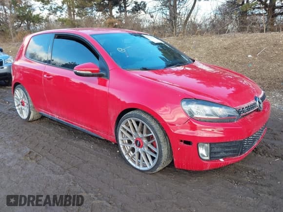 ✅ 2012 Volkswagen Golf GTI w/Conv & Sunroof • VIN: WVWEV7AJ9CW292286 • Lot: 41478359. Listed on IAAI with 153,000 mi. Free auction sales archive from the USA and detailed vehicle history report at DreamBid. Image 1.