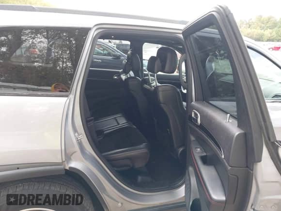 2017 Jeep Grand Cherokee Trailhawk with VIN 1C4RJFLG1HC733460, listed as a IAAI auction lot 43428007 with 149,029 mi miles and . Bid and sale history available at DreamBid. Image 8.