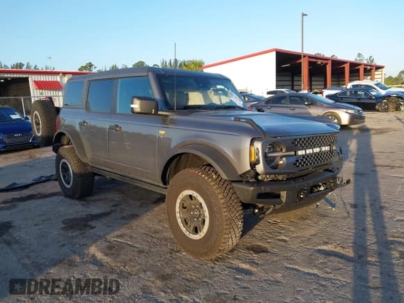 ✅ 2024 Ford Bronco Badlands • VIN: 1FMEE9BP8RLA41215 • Lot: 42148654. Listed on IAAI with 3,573 mi. Free auction sales archive from the USA and detailed vehicle history report at DreamBid. Image 1.