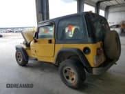 ✅ 2000 Jeep Wrangler Sport • VIN: 1J4FA49S5YP739381 • Лот: 81209995. Опубликован ранее на Copart с пробегом 286 678 миль. Бесплатный доступ к архиву аукционных продаж из США и подробный отчёт об истории автомобиля на DreamBid. Изображение 2.