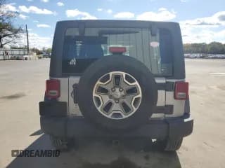 ✅ 2013 Jeep Wrangler Unlimited Sport • VIN: 1C4BJWDG2DL588598 • Лот: 87087875. Опубликован ранее на Copart с пробегом 114 115 миль. Бесплатный доступ к архиву аукционных продаж из США и подробный отчёт об истории автомобиля на DreamBid. Изображение 6.