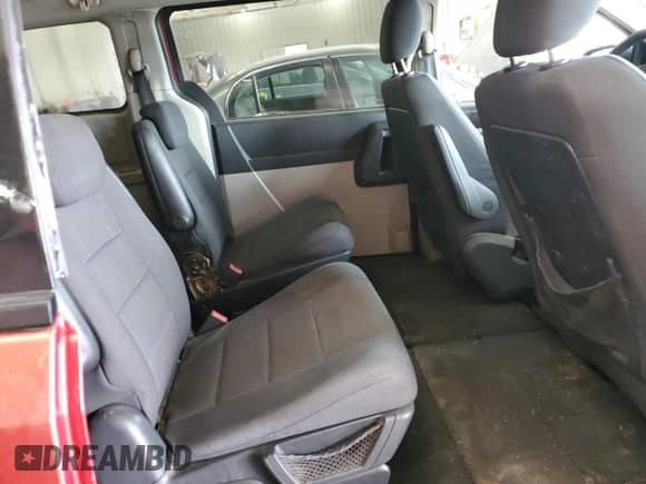 2009 Dodge Grand Caravan SE z VIN 1D8HN44E39B511741, wystawiony jako Copart lot #83869955 z przebiegiem 213 493 mil mil oraz Szkoda całkowita • Salvage title. Historia ofert i sprzedaży dostępna na DreamBid. Obrazek 11.