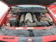 ✅ 2010 Dodge Challenger SRT-8 • VIN: 2B3CJ7DW6AH122510 • Lot: 81069504. Wystawiony na Copart z przebiegiem 108 494 mil. Bezpłatny archiwum sprzedaży aukcyjnych z USA i szczegółowy raport historii pojazdu na DreamBid. Zdjęcie 13.