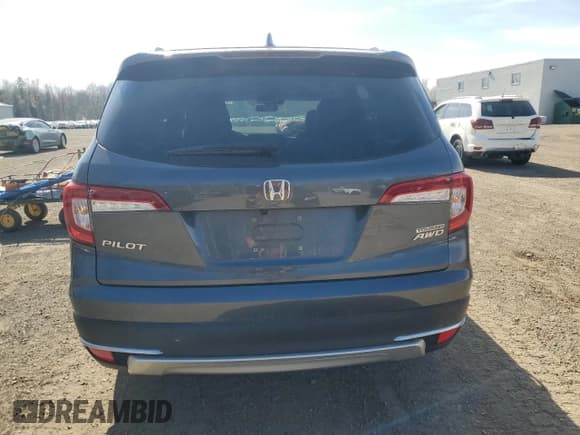 ✅ 2022 Honda Pilot Touring 7-Passenger • VIN: 5FNYF6H61NB504935 • Lot: 51186805. Listed on Copart with 99,373 mi. Free auction sales archive from the USA and detailed vehicle history report at DreamBid. Image 6.