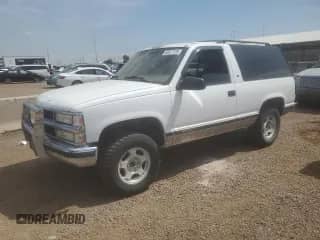 1996 Chevrolet Tahoe с VIN 3GNEK18R6TG171738, выставлен на аукционе Copart как лот 65517125 с пробегом 164 928 миль миль и Чистый • Clean title. История ставок и продаж доступна на DreamBid. Изображение 1.