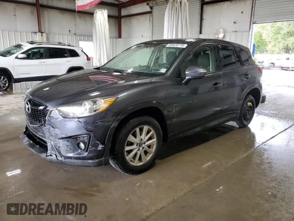 ✅ 2015 Mazda CX-5 Touring • VIN: JM3KE2CY6F0506259 • Lot: 69928775. Listed on Copart with 140,555 mi. Free auction sales archive from the USA and detailed vehicle history report at DreamBid. Image 1.