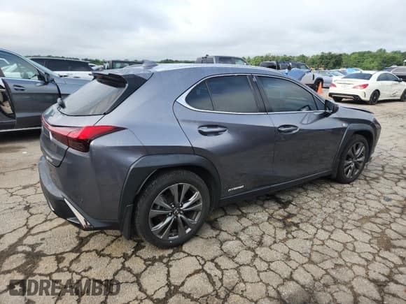 ✅ 2021 Lexus UX 250h F Sport • VIN: JTHR9JBH6M2041702 • Lot: 61157525. Wystawiony na Copart z przebiegiem 64 681 mil. Bezpłatny archiwum sprzedaży aukcyjnych z USA i szczegółowy raport historii pojazdu na DreamBid. Zdjęcie 3.