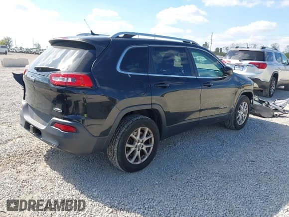 ✅ 2014 Jeep Cherokee Latitude • VIN: 1C4PJMCB8EW226565 • Lot: 43435107. Wystawiony na IAAI z przebiegiem 102 589 mil. Bezpłatny archiwum sprzedaży aukcyjnych z USA i szczegółowy raport historii pojazdu na DreamBid. Zdjęcie 4.