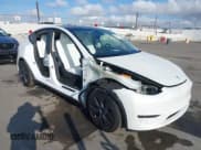 ✅ 2024 Tesla Model Y Long Range • VIN: 7SAYGAEE2RF195688 • Lot: 43322341. Listed on IAAI with 7,331 mi. Free auction sales archive from the USA and detailed vehicle history report at DreamBid. Image 1.