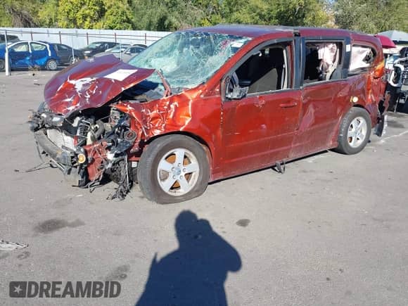 2012 Dodge Grand Caravan SXT z VIN 2C4RDGCG8CR184451, wystawiony jako IAAI lot #43220494 z przebiegiem Nie podano mil oraz . Historia ofert i sprzedaży dostępna na DreamBid. Obrazek 2.