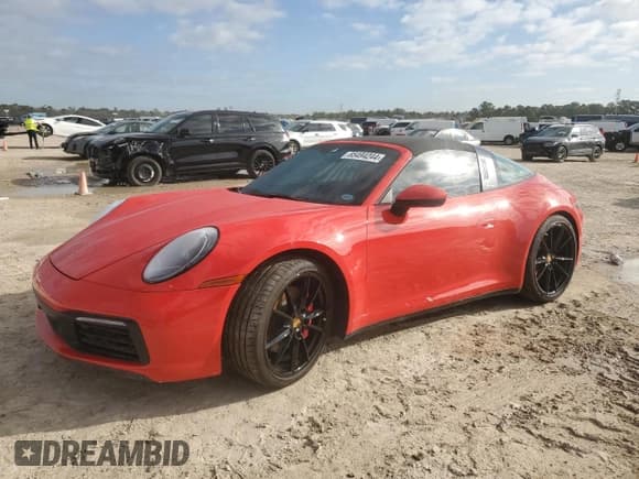 ✅ 2023 Porsche 911 4S • VIN: WP0BB2A94PS233065 • Лот: 85494244. Опубликован ранее на Copart с пробегом Не указан. Бесплатный доступ к архиву аукционных продаж из США и подробный отчёт об истории автомобиля на DreamBid. Изображение 1.